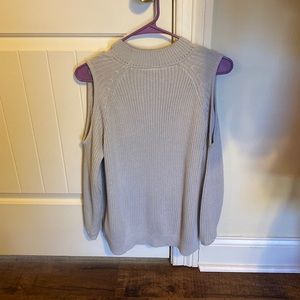 Shoulder cut outs, light gray sweater